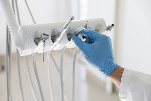 Professional Tooth Extraction technician working in Montgomery County County, TX